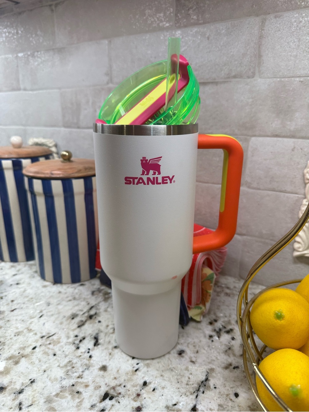 Stanley White Tumbler with Orange Handle and Pink Logo